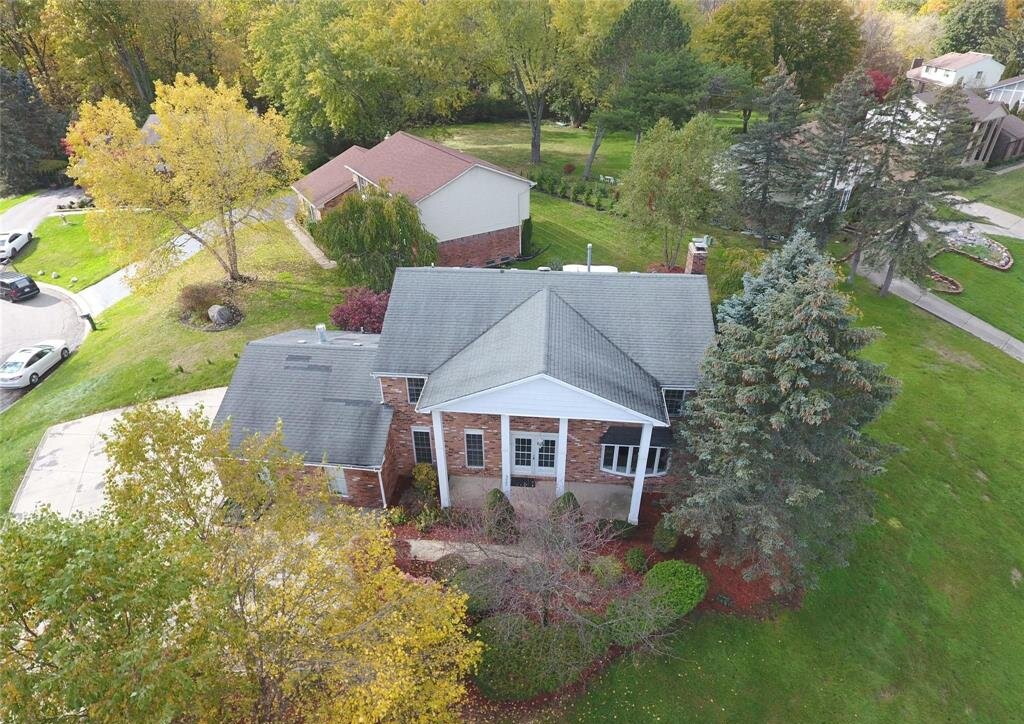 Exterior of luxury fully furnished home leased in Shenandoah Lake in the Woods West Bloomfield MI