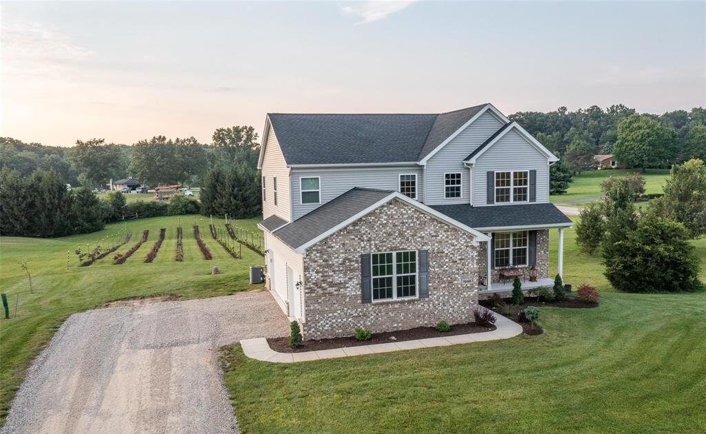 Exterior of sold newer construction home on acreage in Brighton Township MI