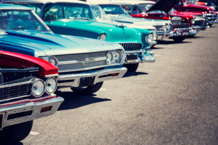 Vintage Cars In A Row At A Car Show On The Street