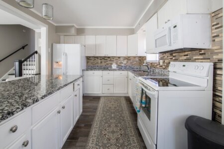 Kitchen with White Cabinets and Appliances