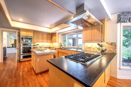 Fallbrook estate with gourmet kitchen, patios, and Sub-Zero appliances