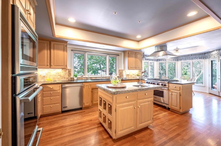 Gourmet kitchen with granite island and stainless appliances – Fallbrook Open House