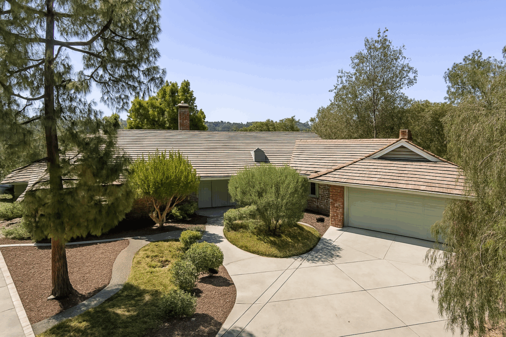 Fallbrook Open House exterior view of 145 Yucca Rd with landscaped entry and mature trees